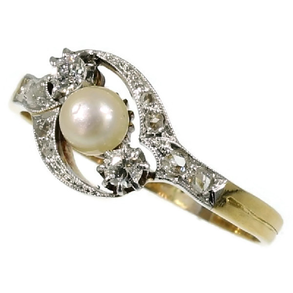 Antique Victorian ring with diamonds and pearl cross over ring engagement ring